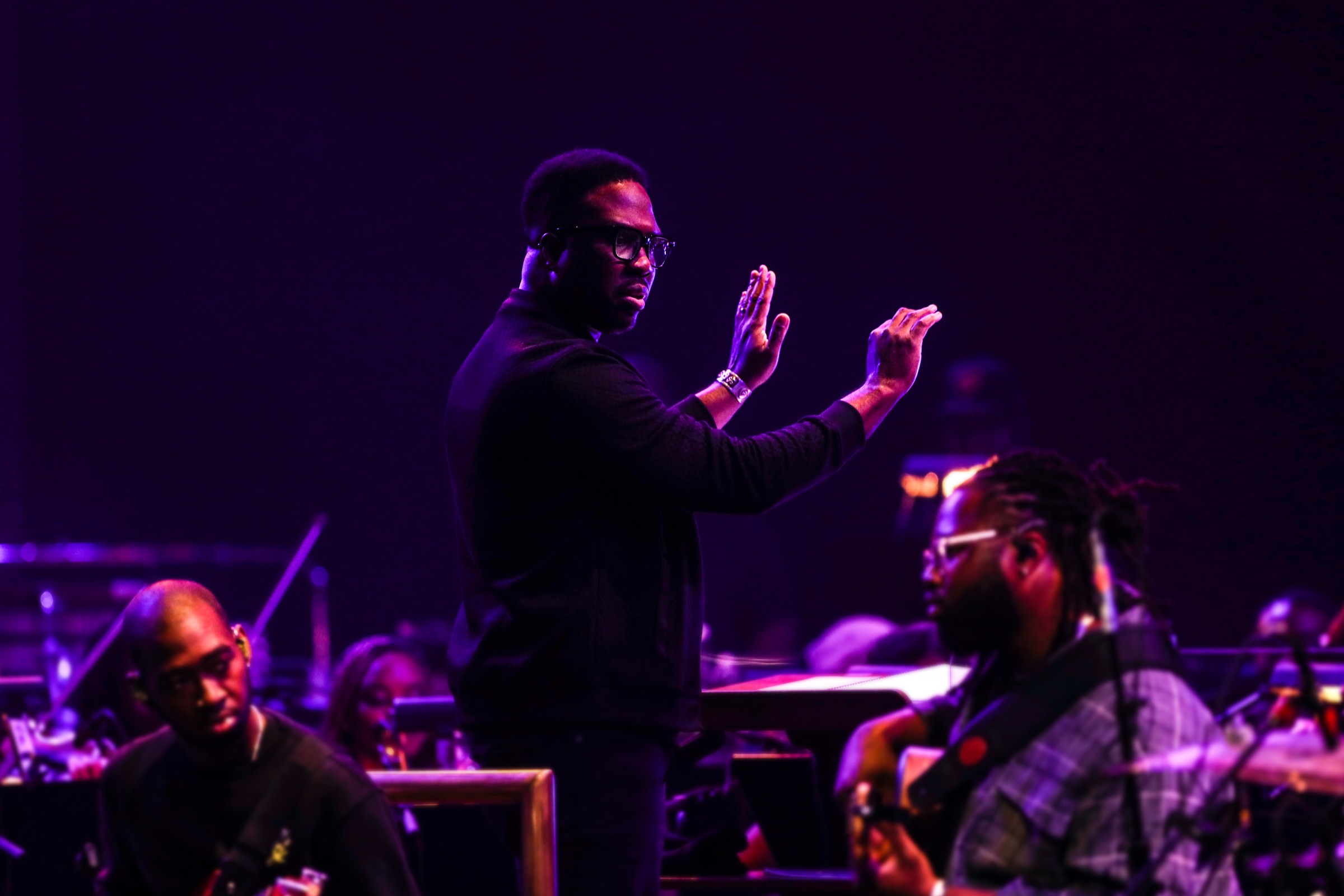 Derrick Hodge conducting
